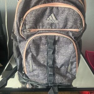 Adidas Gray and pink coral accents LoadSpring backpack.